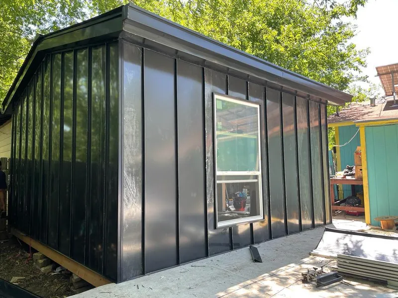 Black standing seam metal wall panels for Metal Roof Installation in New Berlin