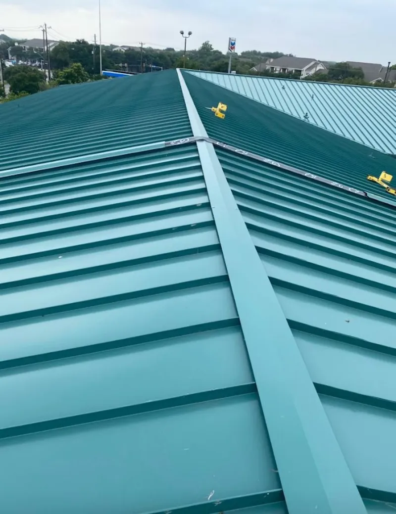 Green commercial metal roof ridge and valley for Metal Roof Repair in New Berlin