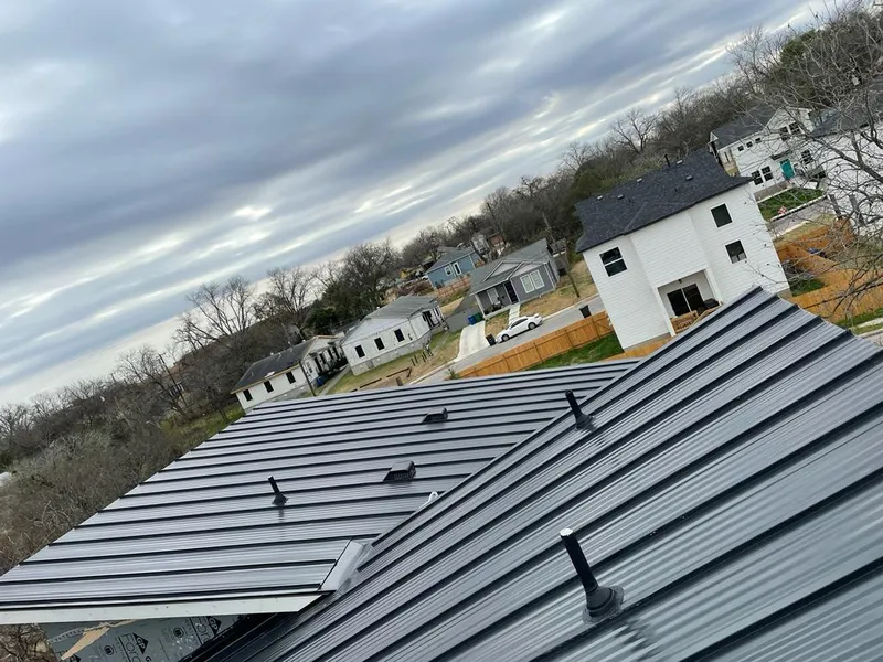 Standing seam metal roof panels with vents for Skylight Repair in New Berlin